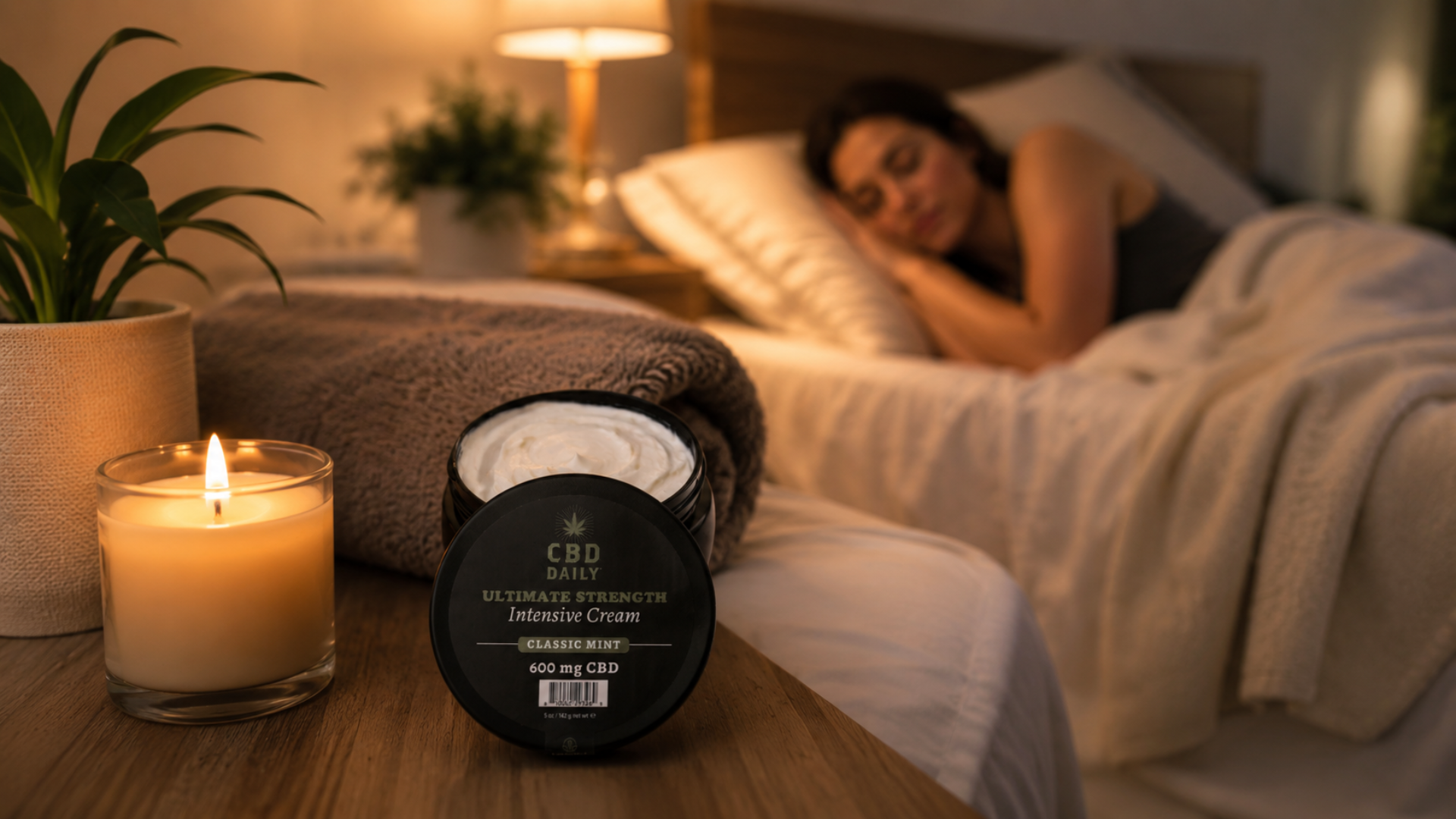 CBD cream beside a bed for an overnight sore muscle recovery routine